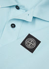 Light blue piqué cotton polo shirt